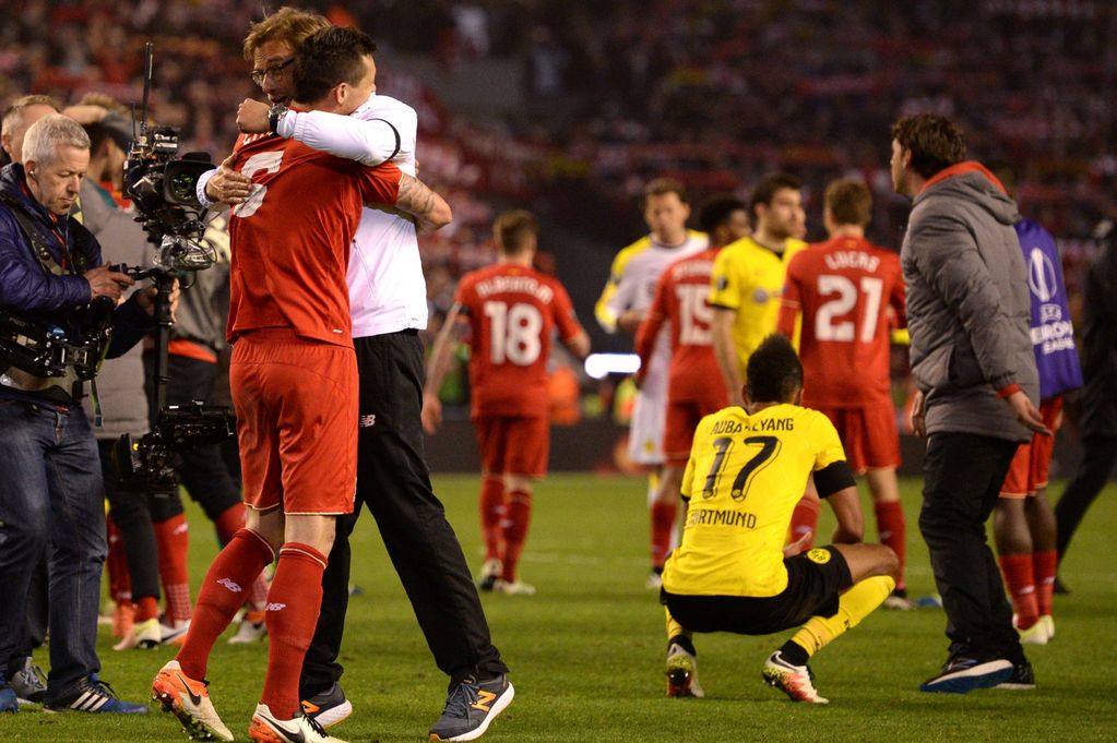 Liverpools-Dejan-Lovren-celebrates-with-manager-Jurgen-Klopp-after-victory